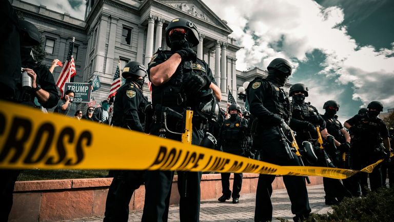 Trump Narrowly Escapes Assassination Attempt, Ignites National Conversation on Political Violence