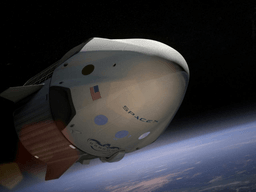 SpaceX spacecraft in orbit with Earth visible in the background