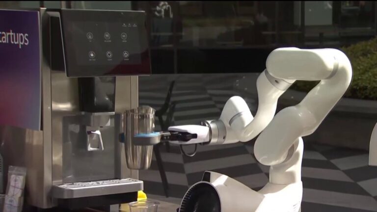 Innovative robot bartender delights guests with food and drinks at